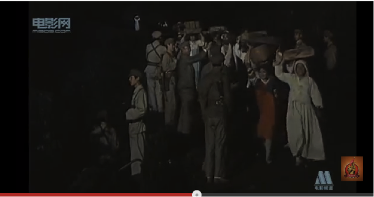 Korean civilians walking past PLA soldiers in 'The Colourful Night'